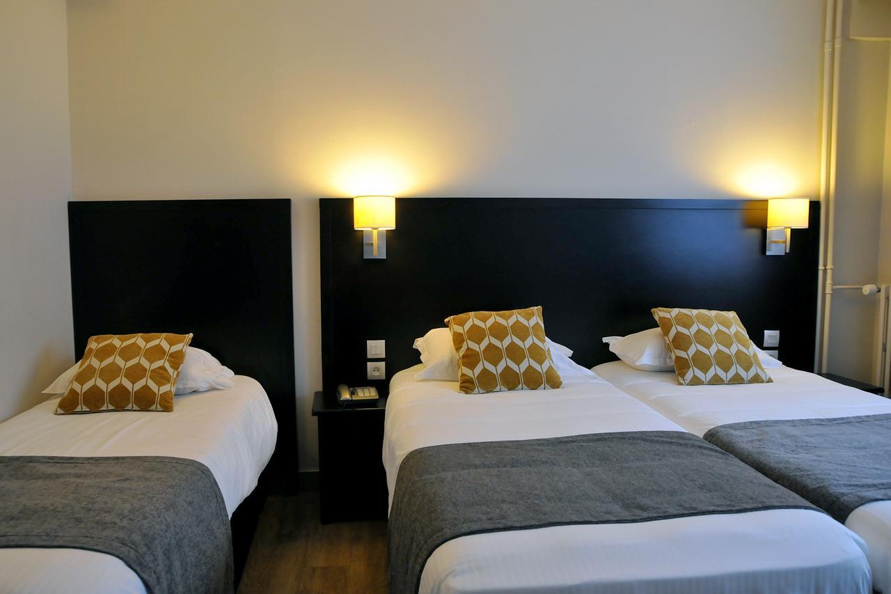 Hotel Des Quatrans Caen Esterno foto