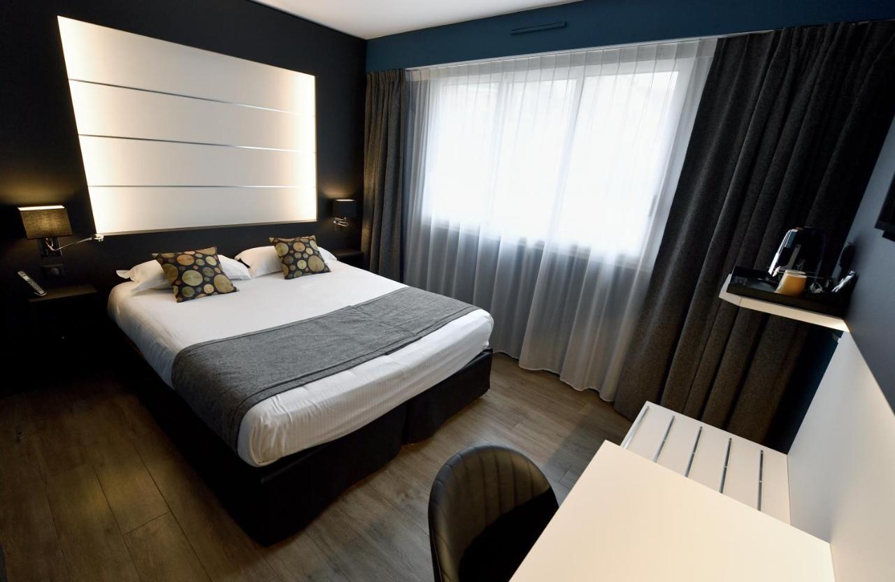 Hotel Des Quatrans Caen Esterno foto