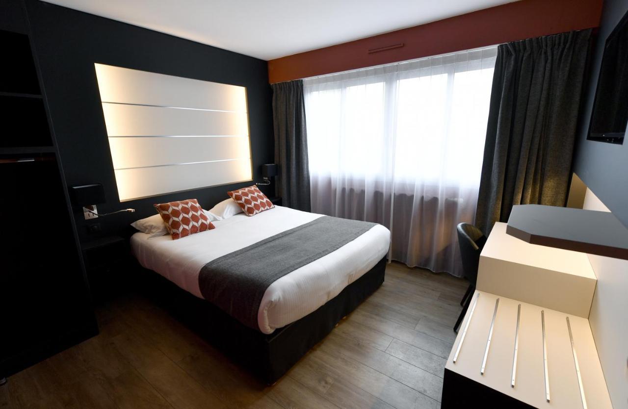 Hotel Des Quatrans Caen Esterno foto